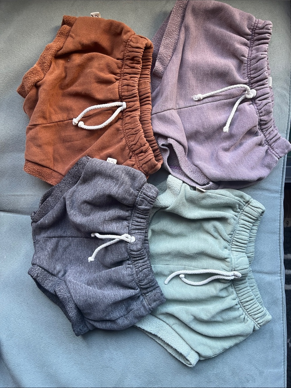 bundle of 4 Childhoods clothing Shorite Shorts in Rust, Lavender, Charcoal, Sage
